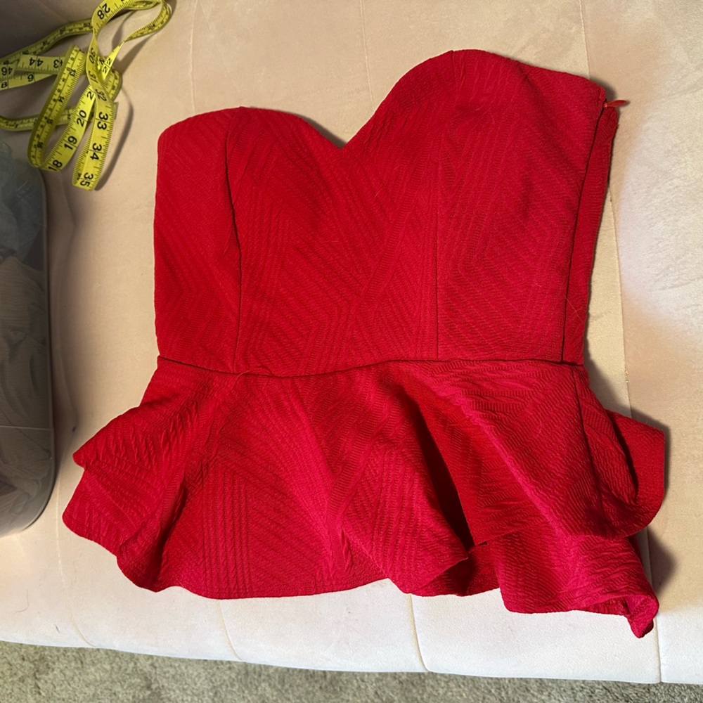 Red strapless peplum top